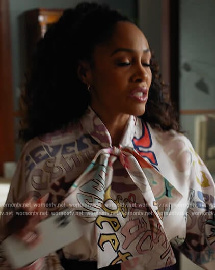 Lola’s printed tie neck blouse on All Rise