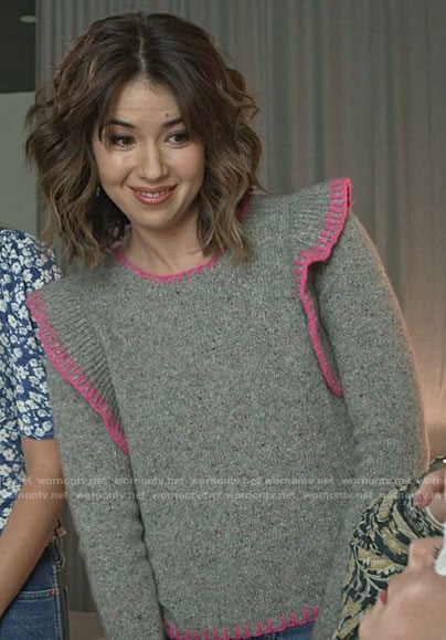 Louise’s grey sweater with pink stitching on Maggie