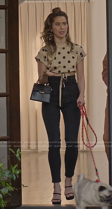 Louise’s polka dot crop top and high waisted jeans on Maggie