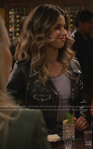 Louise’s studded leather jacket and purple skirt on Maggie