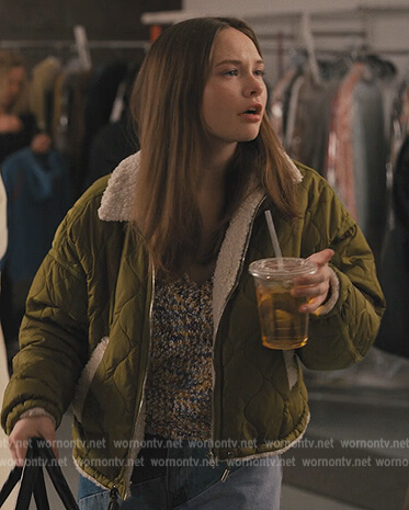 Lucy’s green puffer jacket on Only Murders in the Building