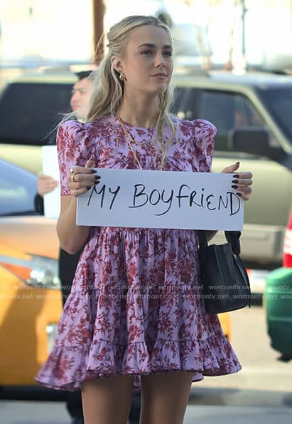 Maggie’s pink floral mini dress at the airport on Maggie