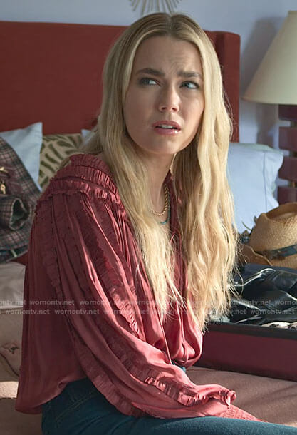 Maggie’s red ruffled satin blouse on Maggie