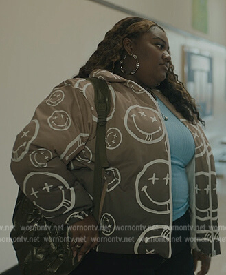 Maisha’s smiley face print jacket on The Chi