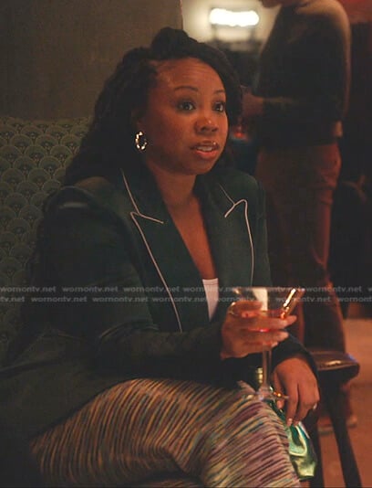 Malika’s green satin blazer on Everythings Trash