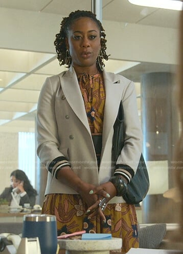 Malika’s yellow floral tie neck dress on Good Trouble