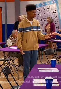 Munchy’s khaki tracksuit on Side Hustle