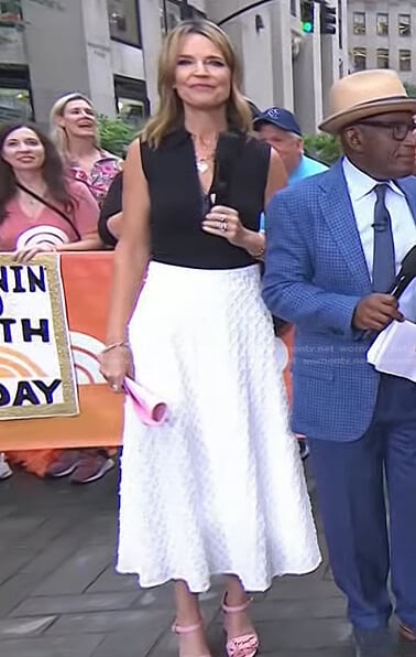 Savannah’s black half-zip top and white textured skirt on Today