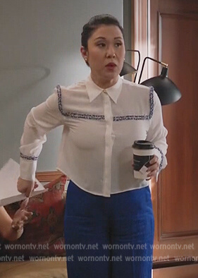 Sherri’s white contrast trim shirt on All Rise