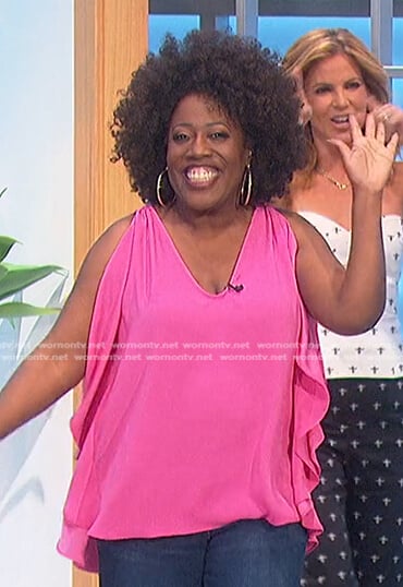 Sheryl’s pink v-neck draped top on The Talk