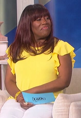 Sheryl’s yellow ruffle top on The Talk