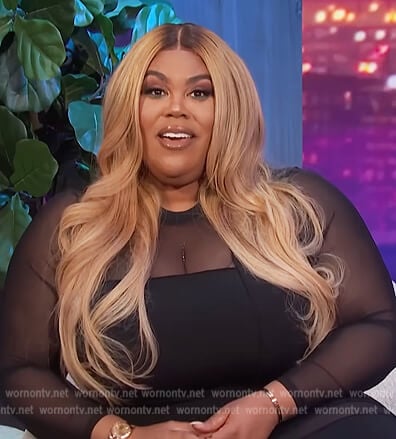 Nina’s black sheer panel dress on E! News Nightly Pop
