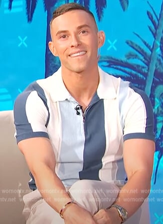 Adam Rippon’s blue striped polo on E! News Daily Pop
