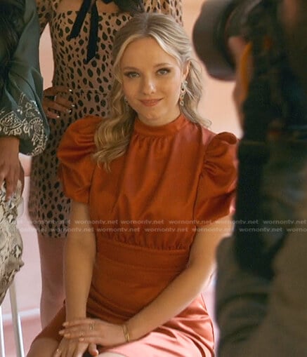 Claire’s orange puff sleeve mini dress on Good Trouble