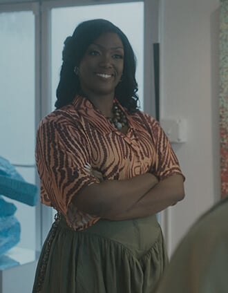 Deja’s orange printed shirt on The Chi
