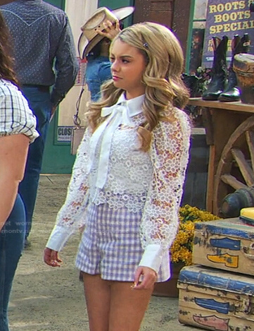 Destiny’s floral lace blouse and lilac plaid shorts on Bunkd