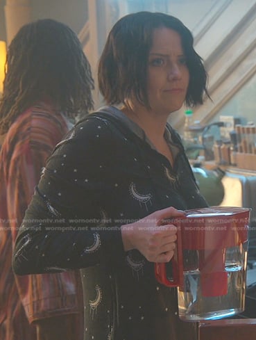 Kelly’s black moon print onesie on Good Trouble