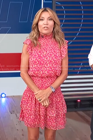 Kit’s pink printed ruffle mini dress on Access Hollywood