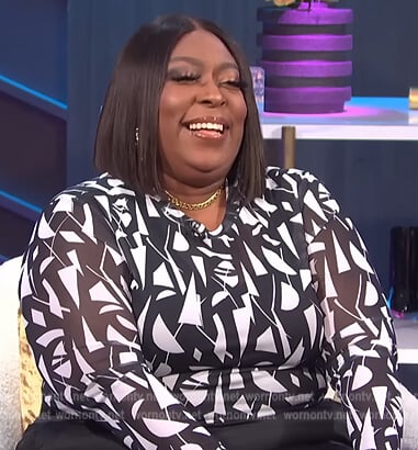 Loni’s printed mesh top on E! News Nightly Pop
