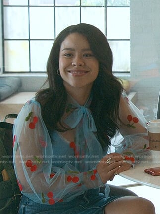 Mariana’s blue cherry embroidered sheer blouse on Good Trouble