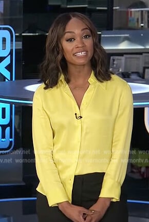Rachel’s yellow lime satin blouse on Extra