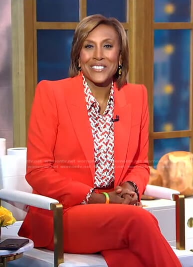 Robin’s print blouse and orange blazer on Good Morning America