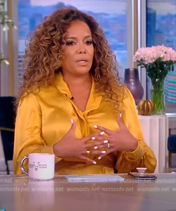 Sunny’s gold satin wrap dress on The View