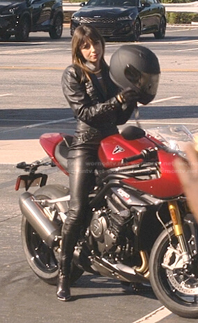 Susannah’s black lace-up leather jacket and pants on Tom Swift