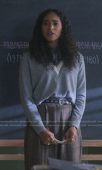 Tabby’s grey v-neck sweater with white trim on Pretty Little Liars Original Sin