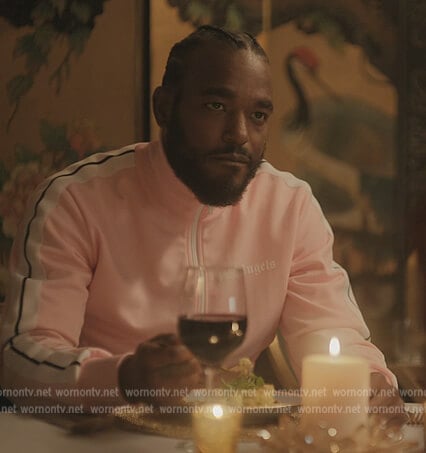 Trig’s pink Palm Angeles track jacket on The Chi