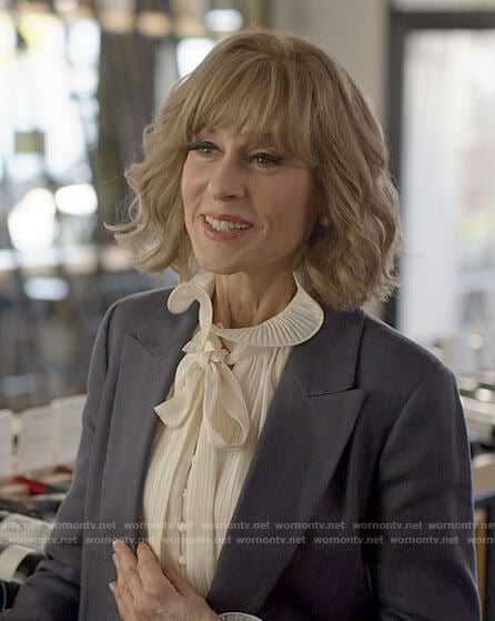 Virginia’s white ruffled blouse on American Horror Stories