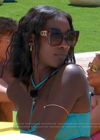 Zeta’s blue t-strap bikini and tortoiseshell cat eye sunglasses on Love Island USA