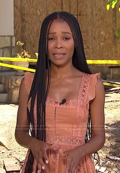 Zuri’s orange lace trim dress on Access Hollywood