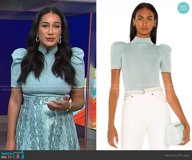 Alice + Olivia Issa Puff Sweater Top worn by Morgan Radford on NBC News Daily