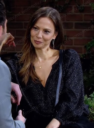 Ava’s black print v-neck blouse on Days of our Lives