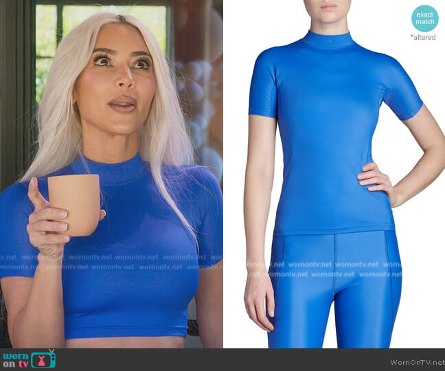 Balenciaga Logo Neck Pullover Top worn by Kim Kardashian (Kim Kardashian) on The Kardashians