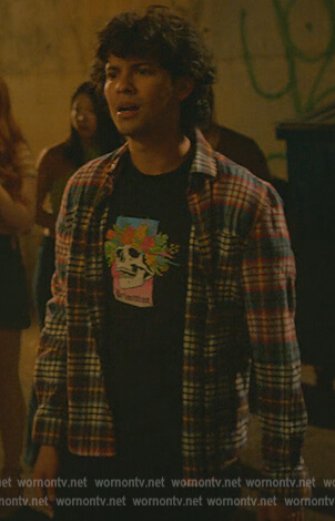 Miguel’s black skull print tee on Cobra Kai