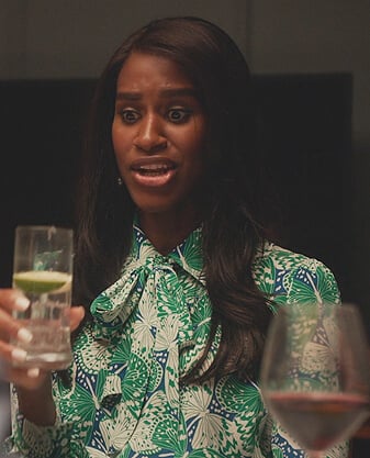 Jessie’s butterfly print tie neck blouse on Everythings Trash