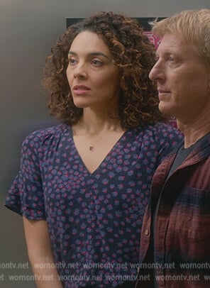 Carmen’s blue floral print v-neck top on Cobra Kai