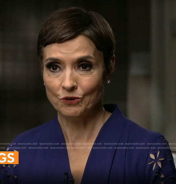 Catherine Herridge’s navy blue eyelet sleeve dress on CBS Mornings