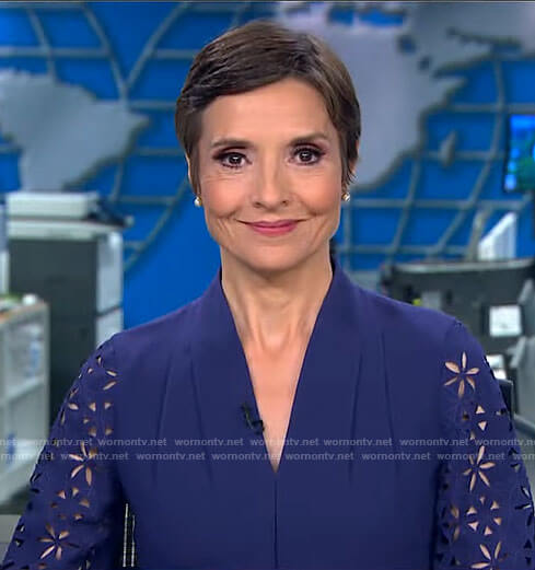 Catherine Herridge’s navy blue eyelet sleeve dress on CBS Mornings