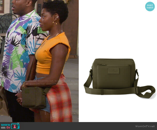Dagne Dover Micah Crossbody in Dark Moss worn by Necie (Chelsea Harris) on The Neighborhood