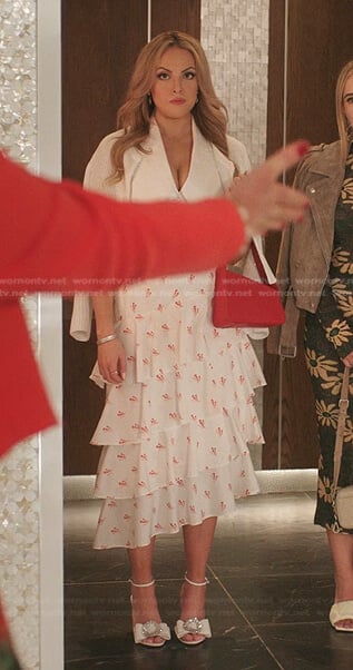 Fallon’s white embellished buckle top and tiered skirt on Dynasty