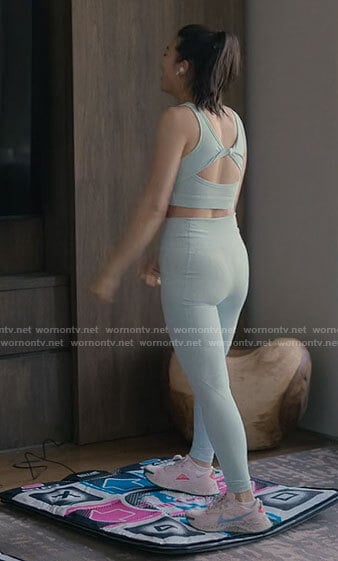 Ingrid’s light blue twist back sports bra and leggings on Partner Track