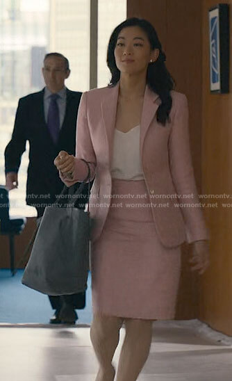 Ingrid’s pink suit and grey tote bag on Partner Track
