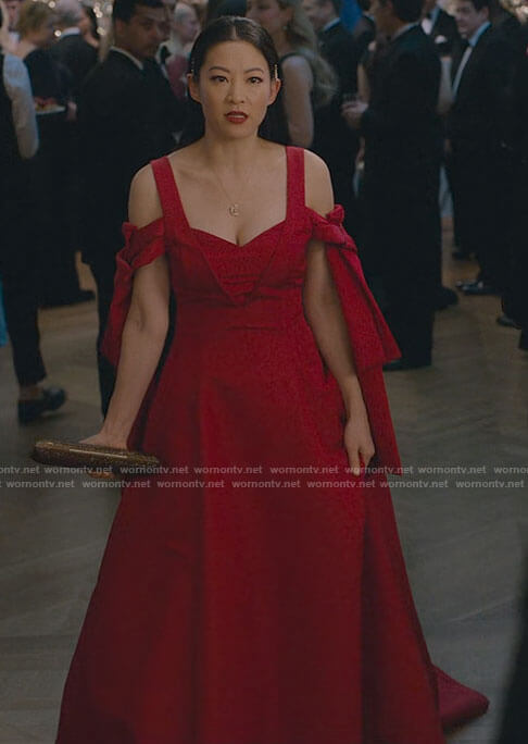 Ingrid’s red tie sleeve gown on Partner Track