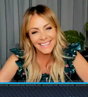 Katie Kraus’s green floral ruffle dress on Extra