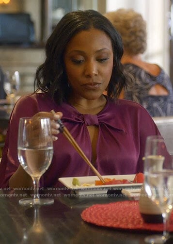 Kayla’s purple knotted top on Monarch