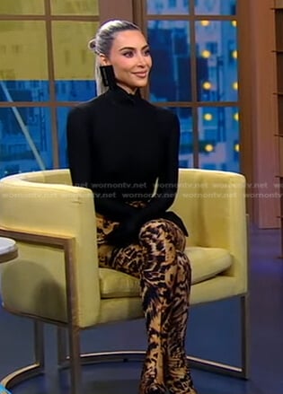 Kim Kardashian’s black turtleneck top and animal print pants on Good Morning America