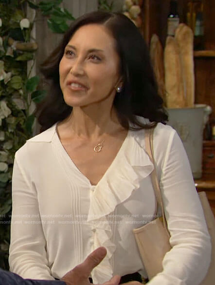 Li’s ivory ruffled blouse on The Bold and the Beautiful